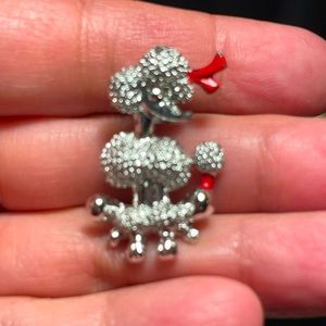 Gorgeous little poodle pin with red ribbon